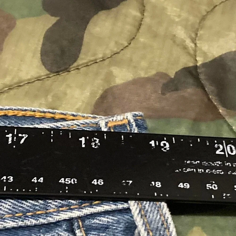 Vintage 00s Levi's 501xx button fly denim‎ paper tag